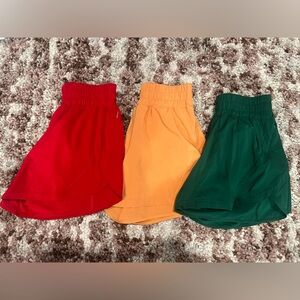LIKE NEW 3 pairs of lululemon track that 5” shorts size 4